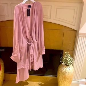 High-low blouse ice pink dressy or you can dress it down with tights or jeans